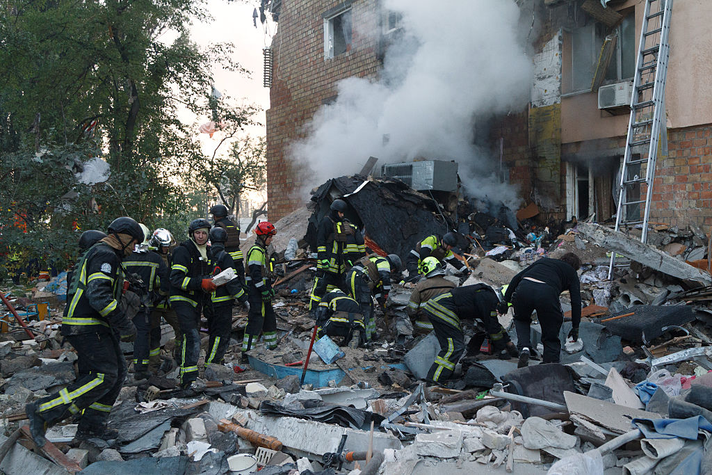 Missile attacks in Ukraine leave 23 dead, EU HQ damaged