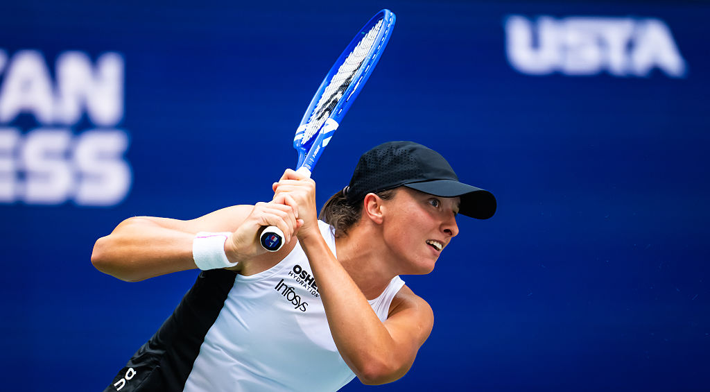 In-form Swiatek survives scare to reach US Open third round