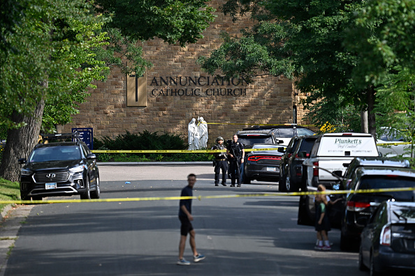 Shooter kills two Minneapolis school children in Catholic church, wounds 17 others