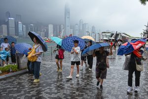 Hong Kong issues highest weather warning, as rains shut schools, courts and hospital wards