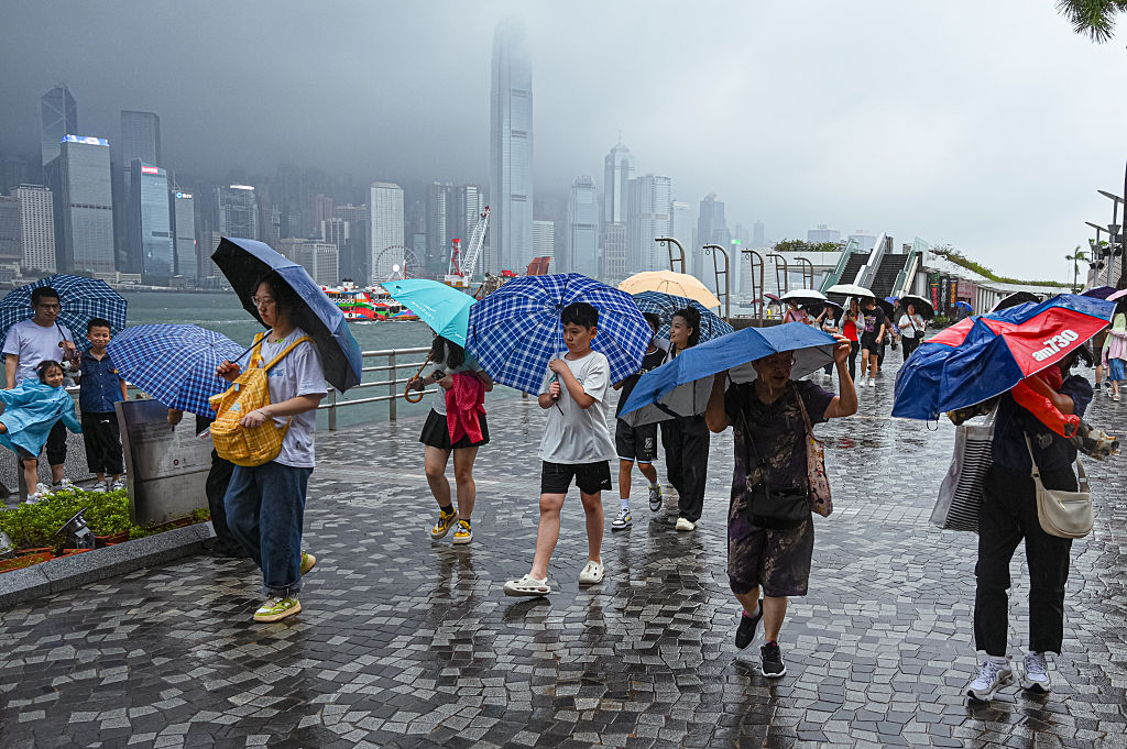 Hong Kong issues highest weather warning, as rains shut schools, courts and hospital wards