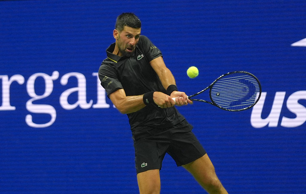 Djokovic battles past Tien to reach US Open second round