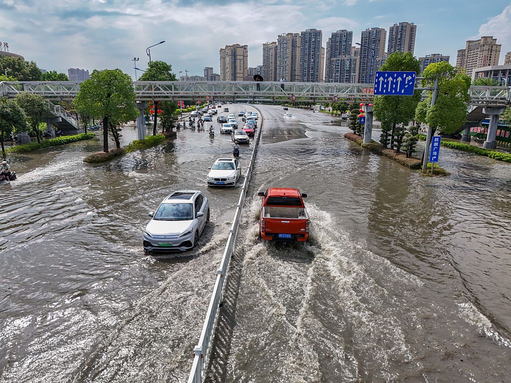Tropical storm Podul disrupts travel and schools in southern China