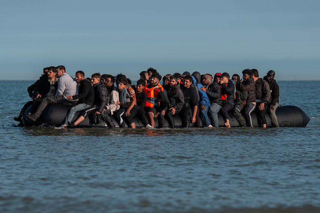 UK threatens jail for people smugglers who advertise on social media