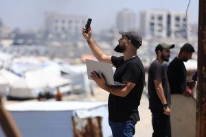 Gaza hit by telecoms blackout as Israeli tanks advance