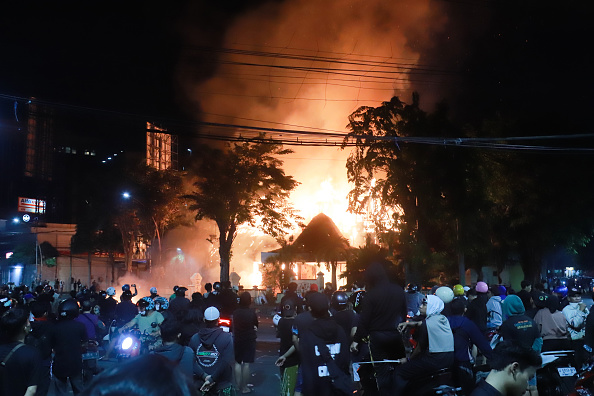 Indonesia police fire tear gas near campuses, riling rights groups
