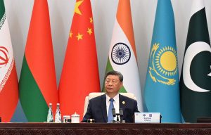 China's Xi pushes a new global order, flanked by leaders of Russia and India