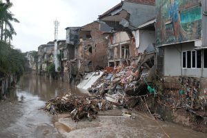 Bali floods kill 14, search continues for two missing