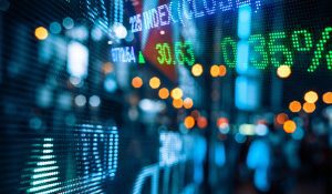 Sensex, Nifty close marginally lower ahead of key RBI decision