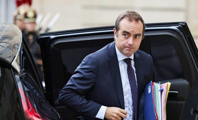 French PM survives no-confidence votes after making pension concession