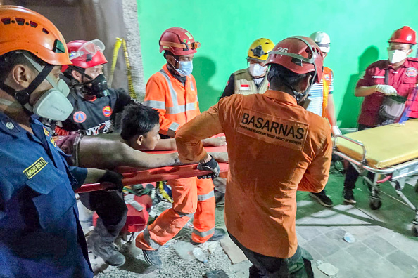 Death toll rises to 9 as rescuers search for trapped Indonesian students
