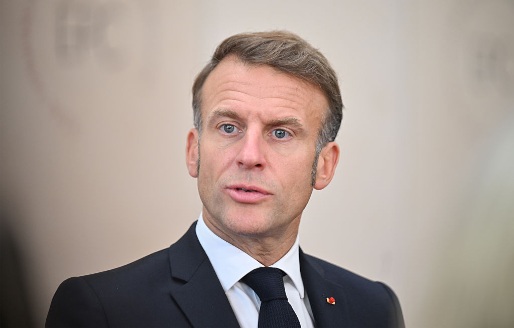 Election calls heap pressure on Macron to end political crisis