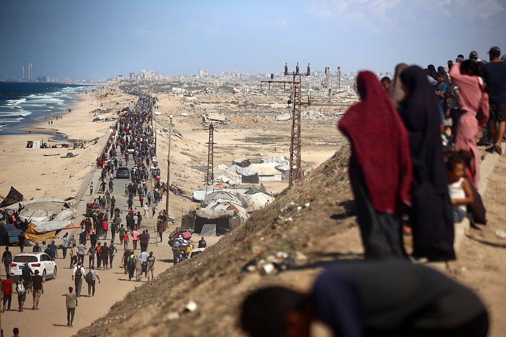 Gazans stream back home as Israel-Hamas ceasefire holds