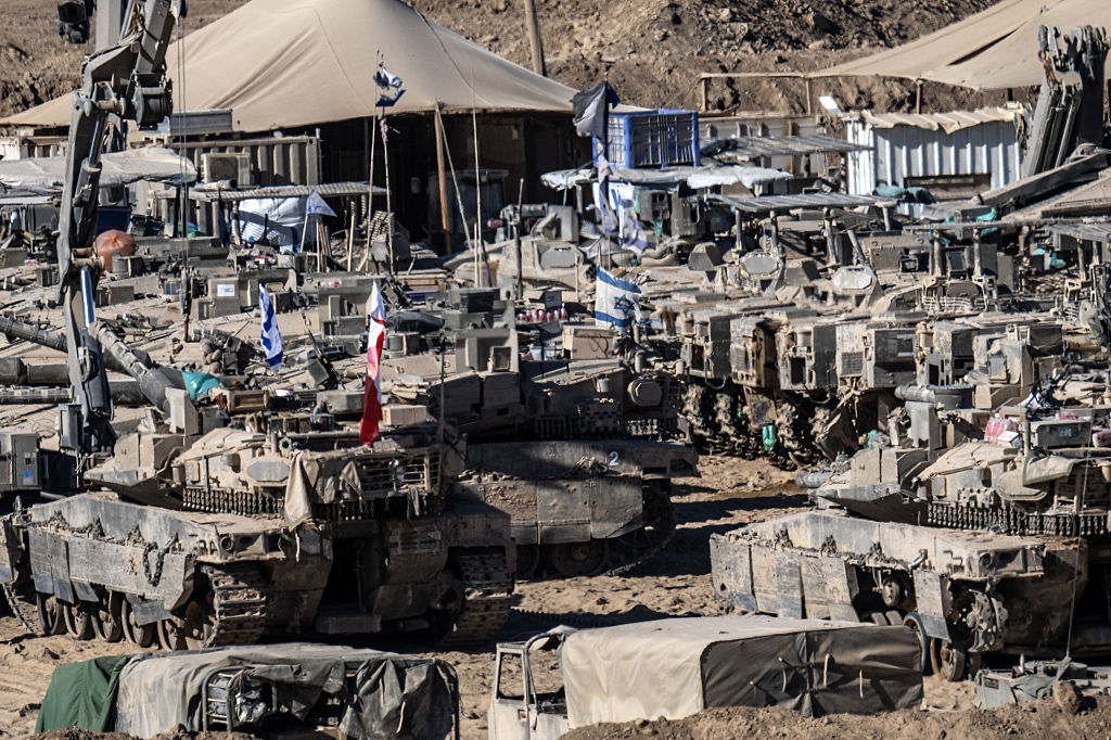 Hamas hands over hostage bodies after Israel threatens aid cut