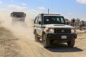 Aid trucks roll into Gaza as dispute over hostage bodies is paused