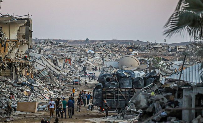Gaza ceasefire outlook darkens as Israel delays aid and Hamas tightens grip