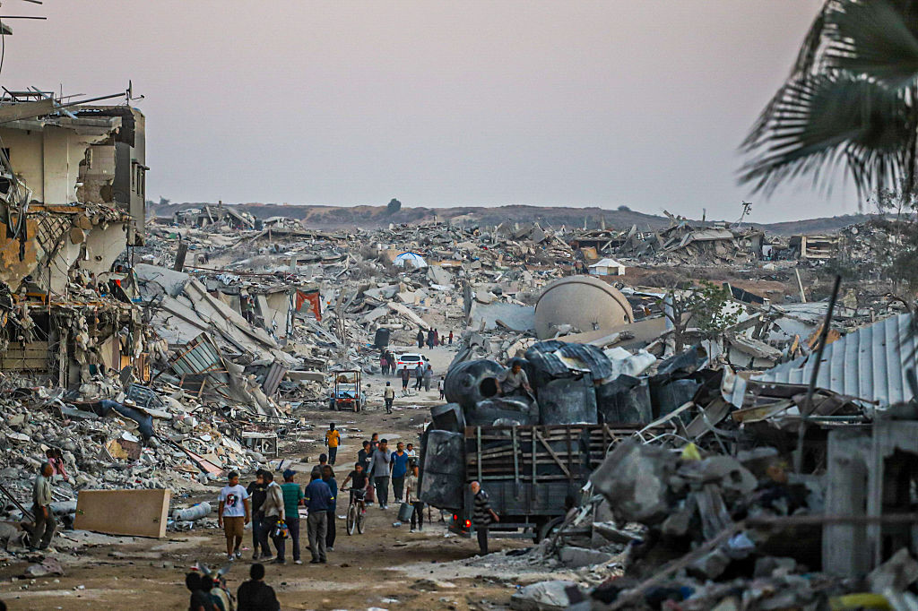 Gaza ceasefire outlook darkens as Israel delays aid and Hamas tightens grip
