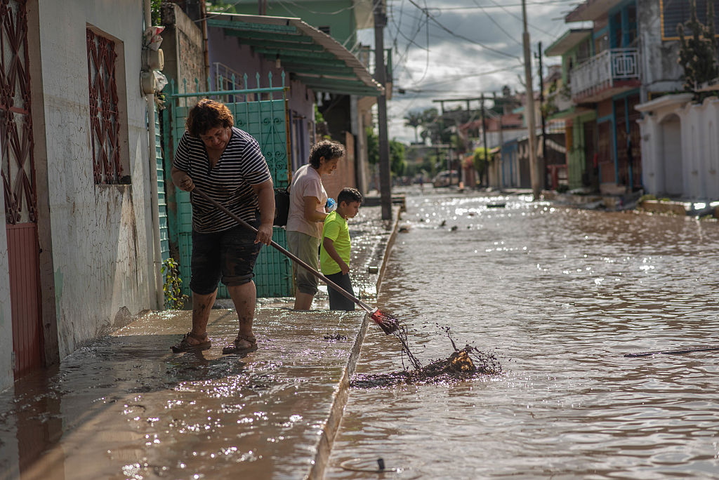 Torrential rains, flooding leave at least 64 dead, 65 missing in Mexico