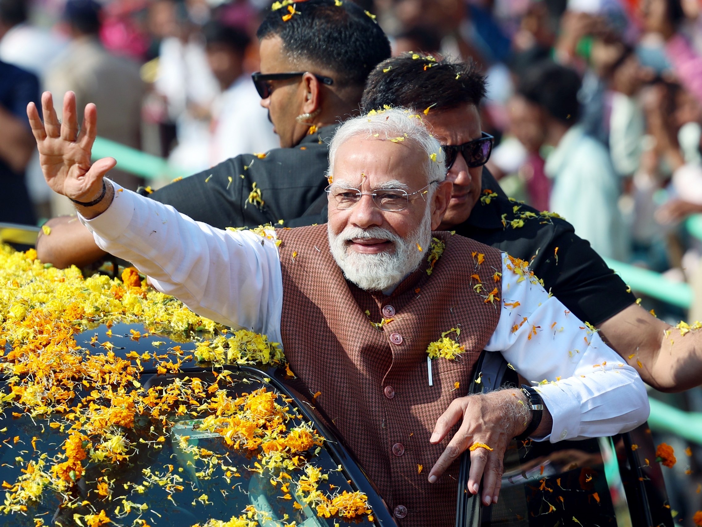 PM Modi inaugurates 42 EMRS, 228 community centres and flags off 250 buses for tribal districts in Gujarat