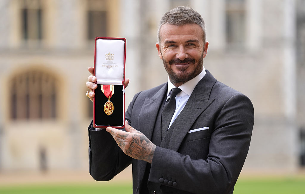 David Beckham knighted for services to sport and charity