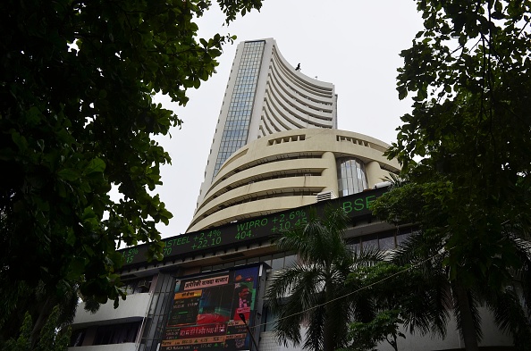 Sensex, Nifty end higher after hitting record levels