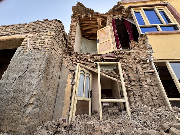 Afghans begin clean-up after powerful earthquake that killed 20