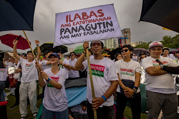 Thousands of anti-graft protesters take to streets of Philippines capital for second day