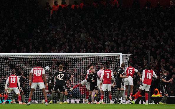 Soccer-Arsenal stun Bayern Munich to seize Champions League top spot
