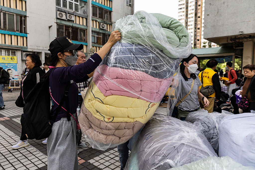 Hong Kong residents scramble to deliver aid, support after deadly fire