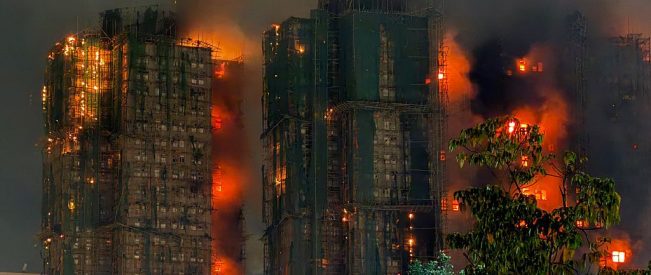 Fire engulfs Hong Kong residential building killing at least 14 people, trapping others