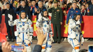 Chinese astronauts return to Earth after vessel damaged by space debris