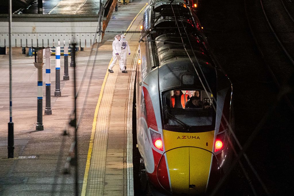 UK train stabbings injure nine, police arrest two suspects
