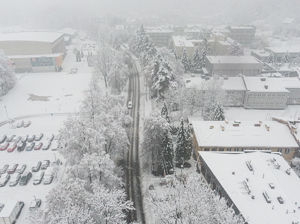 Heavy snow in Poland leaves drivers stranded in tailbacks of up to 20 km