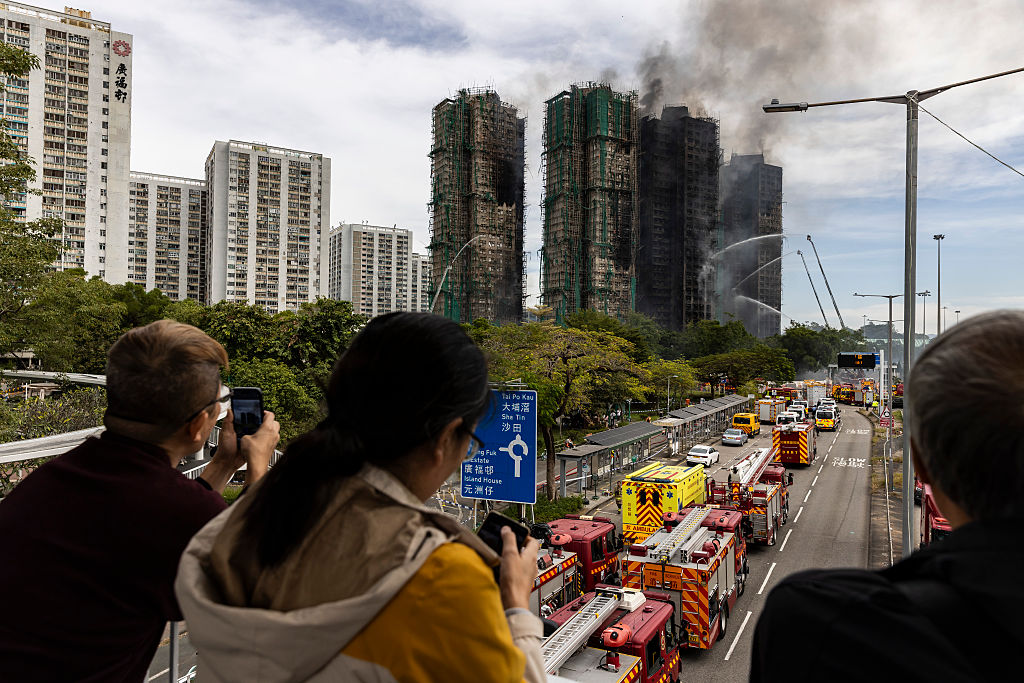 Police comb fire-ravaged Hong Kong apartments, death toll at 146