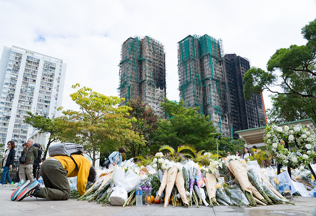 Hong Kong faces low election turnout as residents mourn deadly fire