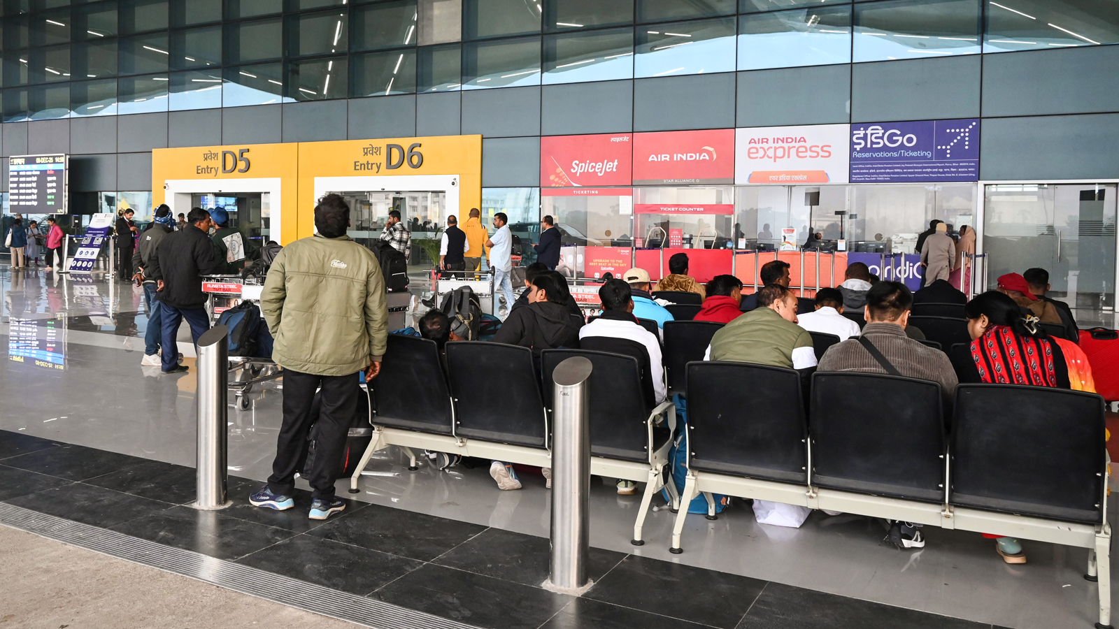 Dense fog disrupts air and rail services across north India; 128 flights cancelled at Delhi airport