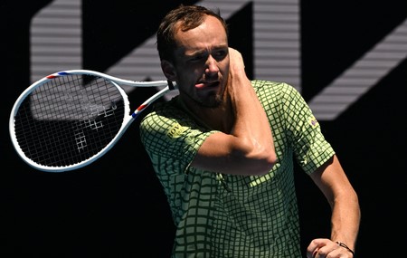 Medvedev rallies from two sets down to reach Australian Open fourth round