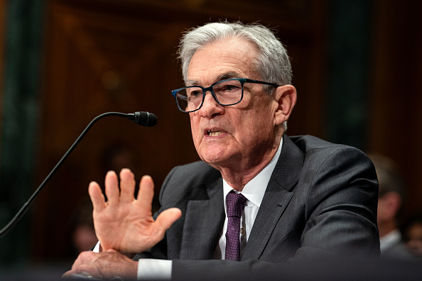 Fed leaves rates unchanged, sees ‘somewhat elevated’ inflation and stabilizing job market