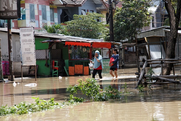 Flash floods in Indonesia’s North Sulawesi kill 14, four still missing