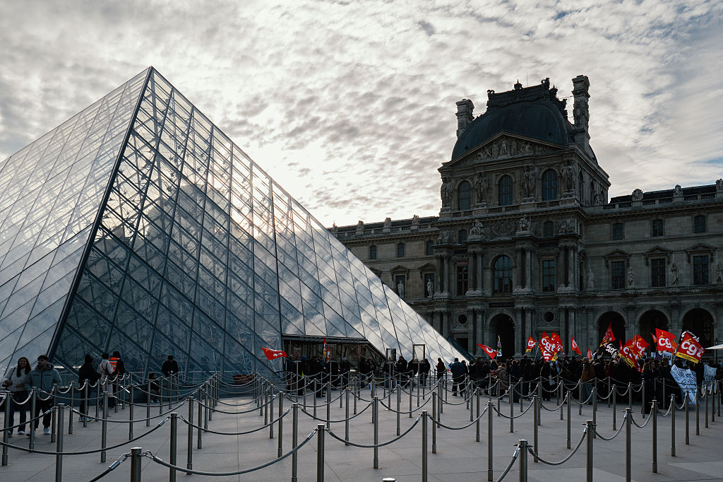 Paris’ Louvre museum opens but some parts stay closed as staff resume strike