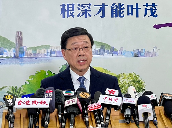 Hong Kong arrests 21 for corruption in building renovation crackdown