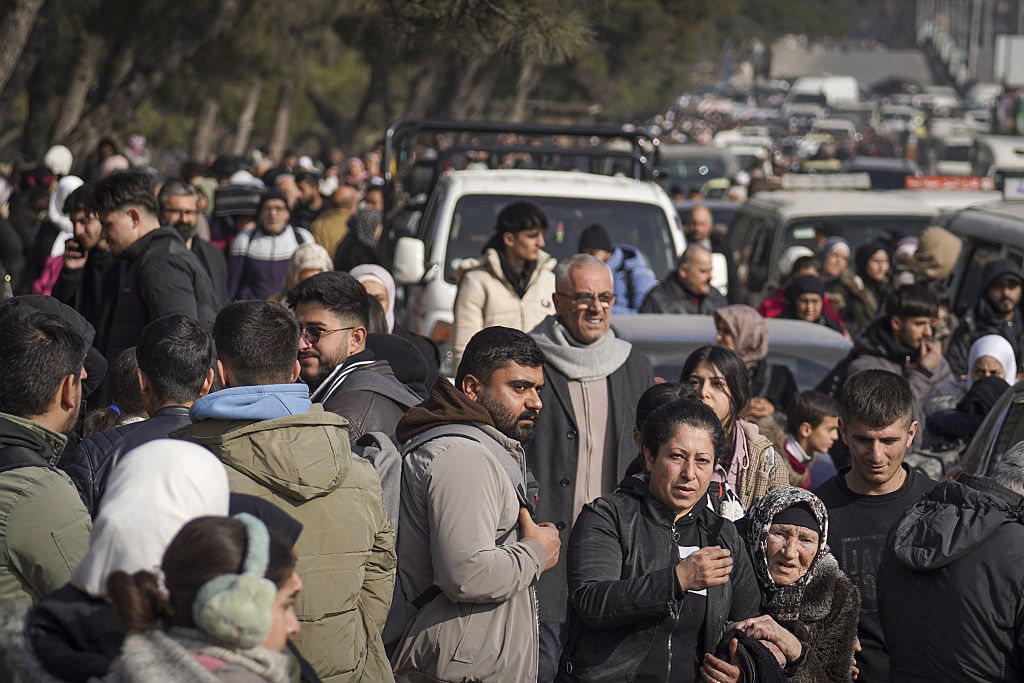Thousands flee as fighting erupts in Aleppo between Syrian forces and Kurdish militia