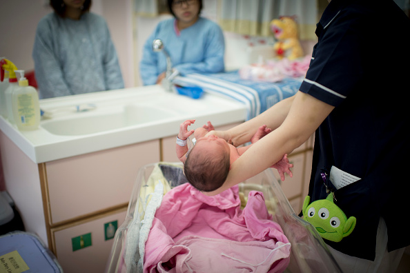China’s population drops for fourth year as fewer babies born