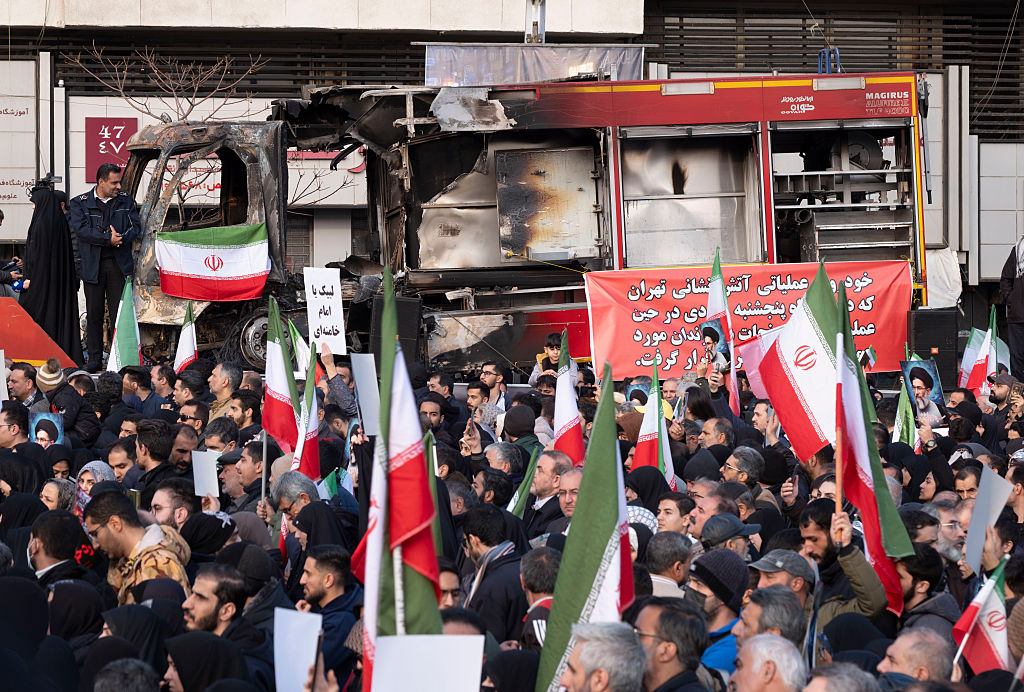 Gory tales emerge from Iran as international calls resume amid weeks-long turmoil