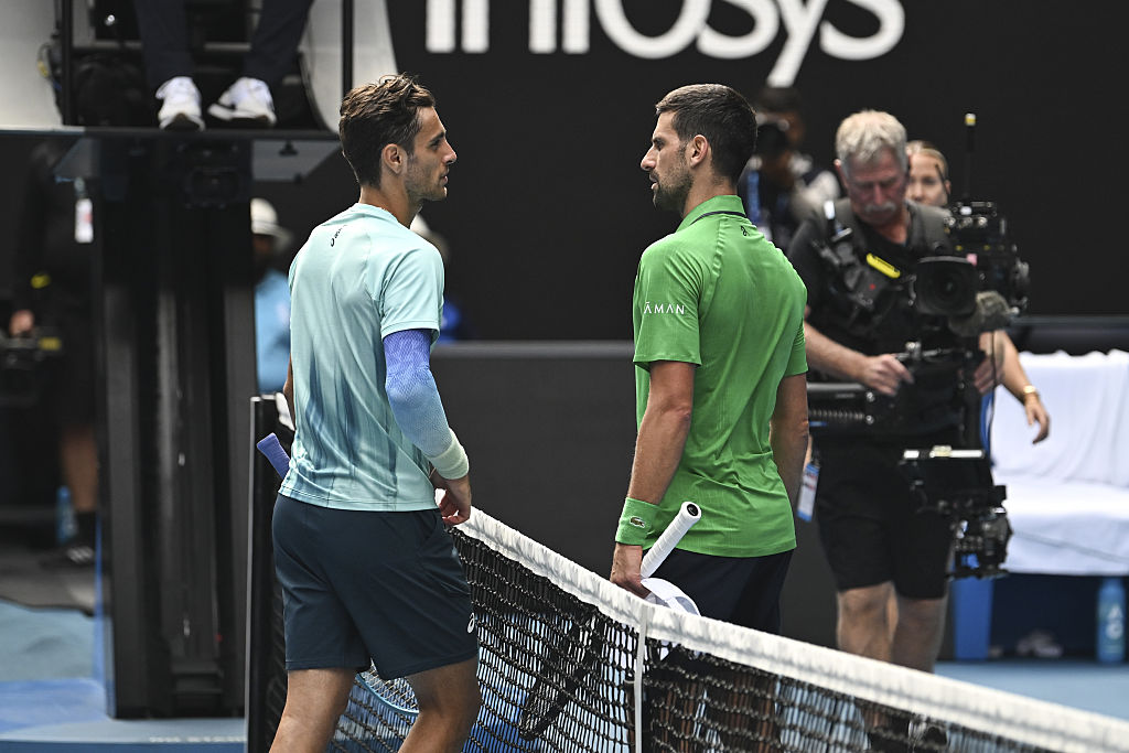 Djokovic gets out of jail to reach Melbourne semis as Musetti retires