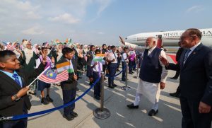 PM Modi arrives in Kuala Lumpur; leaders travel together to community programme