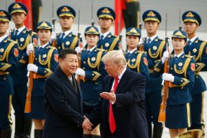 Chinese exporters 'numb' to US threats as Trump set to visit