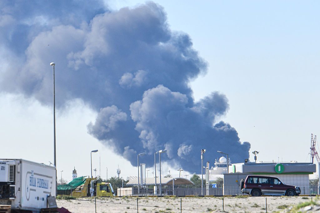 One killed as Iranian drones breach Kuwait’s air defences, crippling airport terminal
