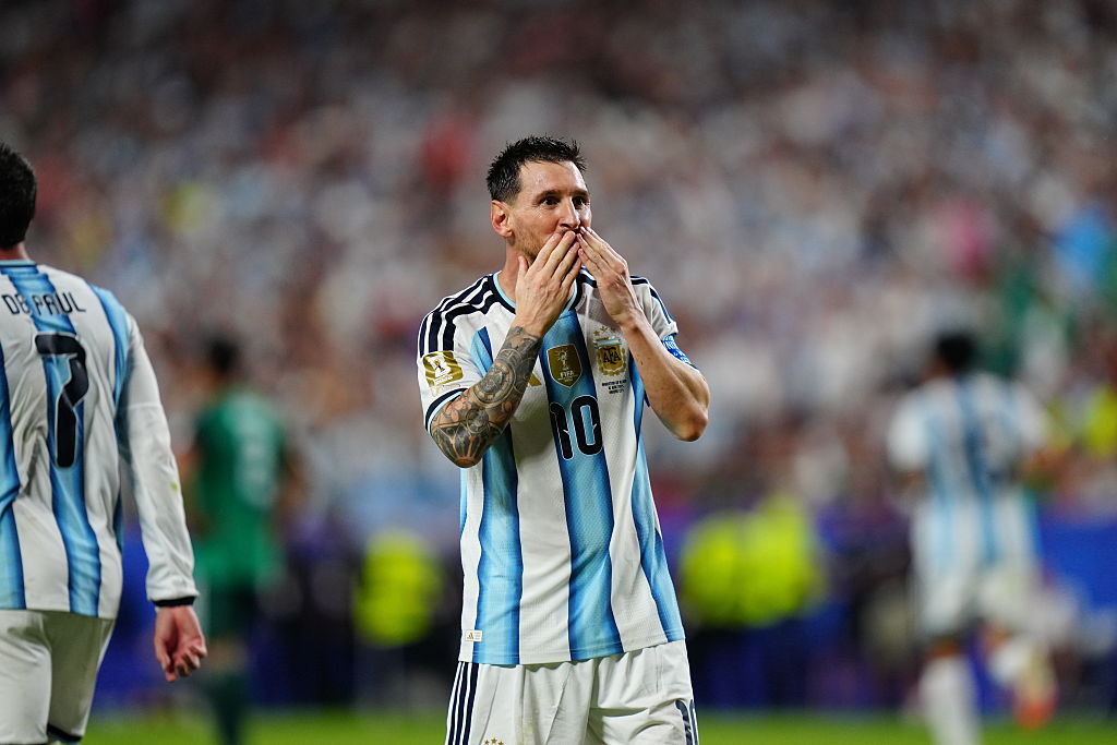 Messi hat-trick equals goalscoring record as Argentina beat Algeria
