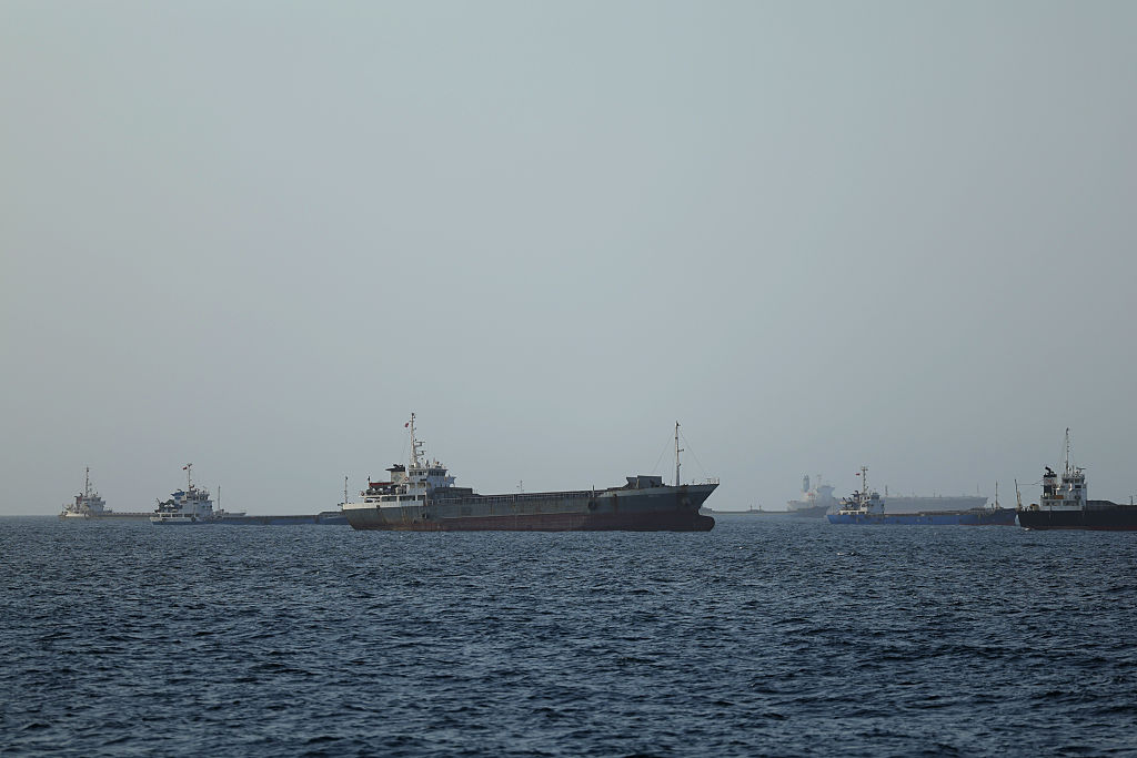 First tankers cross strait after Iran deal; Israeli strikes stir doubt in Lebanon